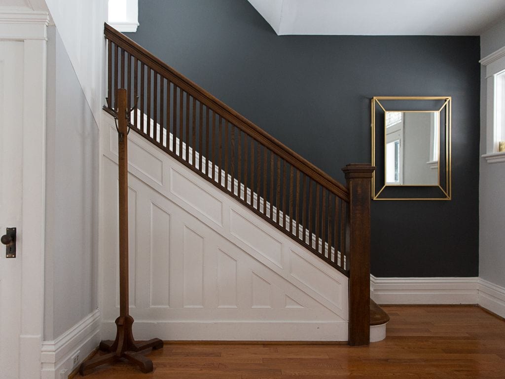 Black accent wall on stairs