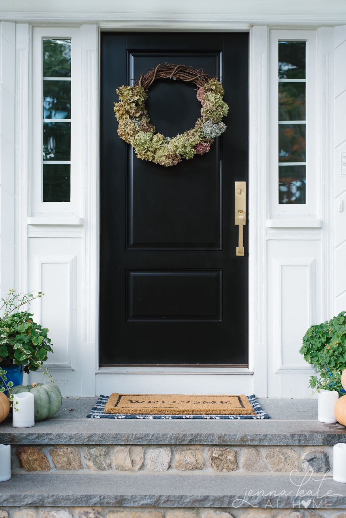 Hydrangea wreath hanging on the front door for fall decor