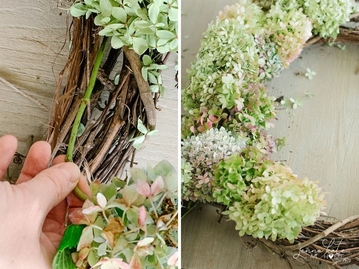 Inserting the hydrangea stems into the wreath