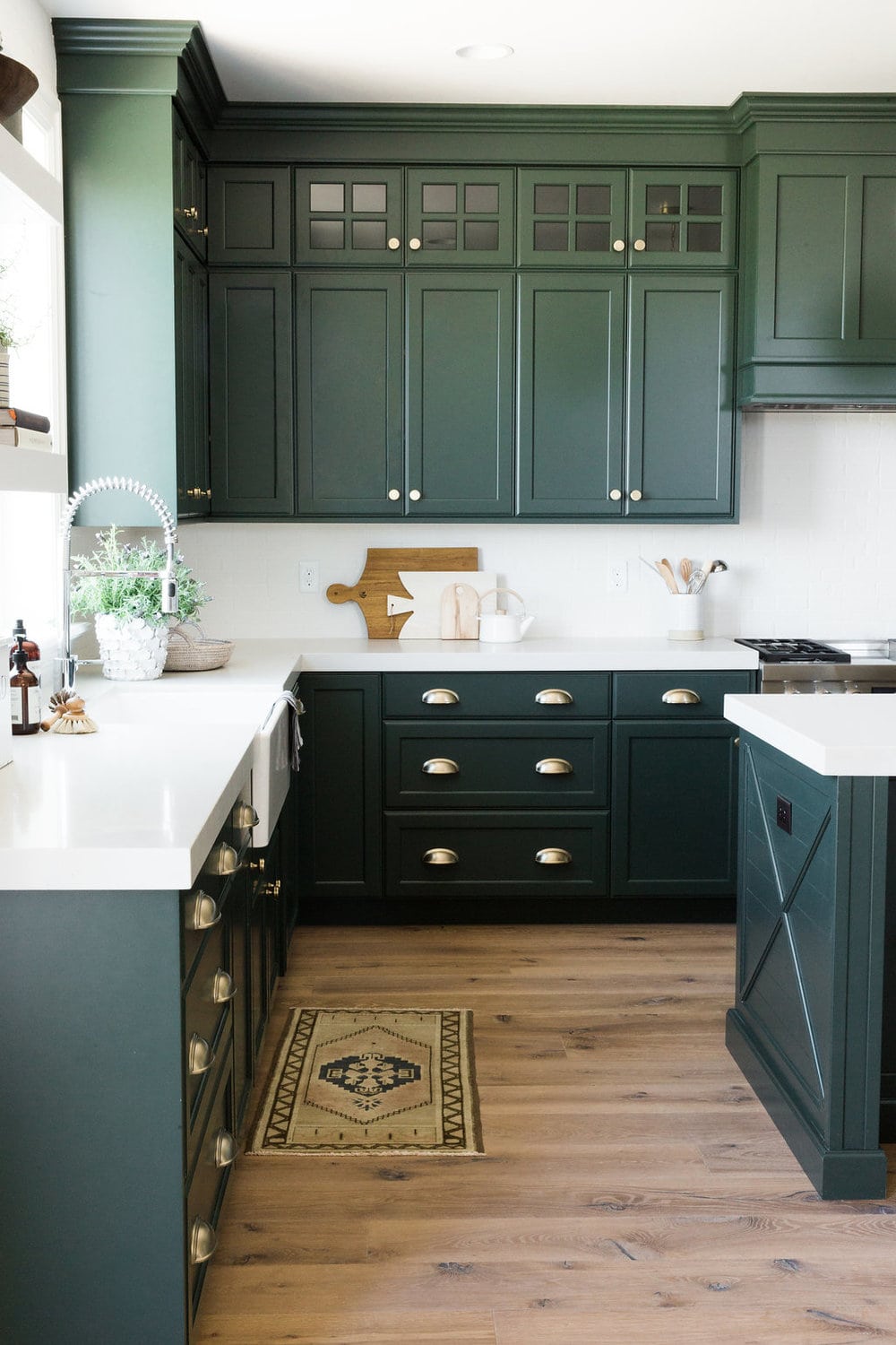 Glossy kitchen cabinets painted dark green color Dunn Edwards Black Spruce