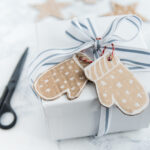 natural gift tags on white gift box for Christmas