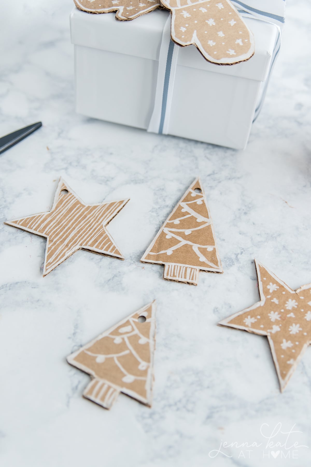 Christmas tree and star cut outs from cardboard for gift tags