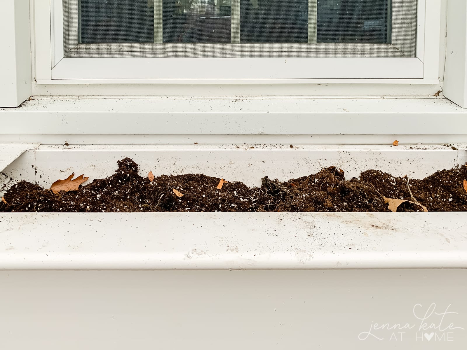 Window box with just dirt in it