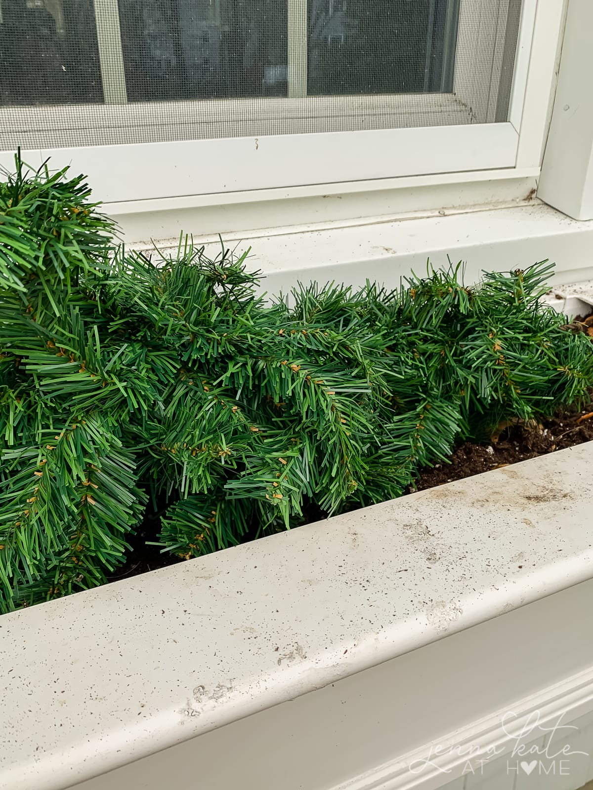 Artificial greenery to line the base of the window box