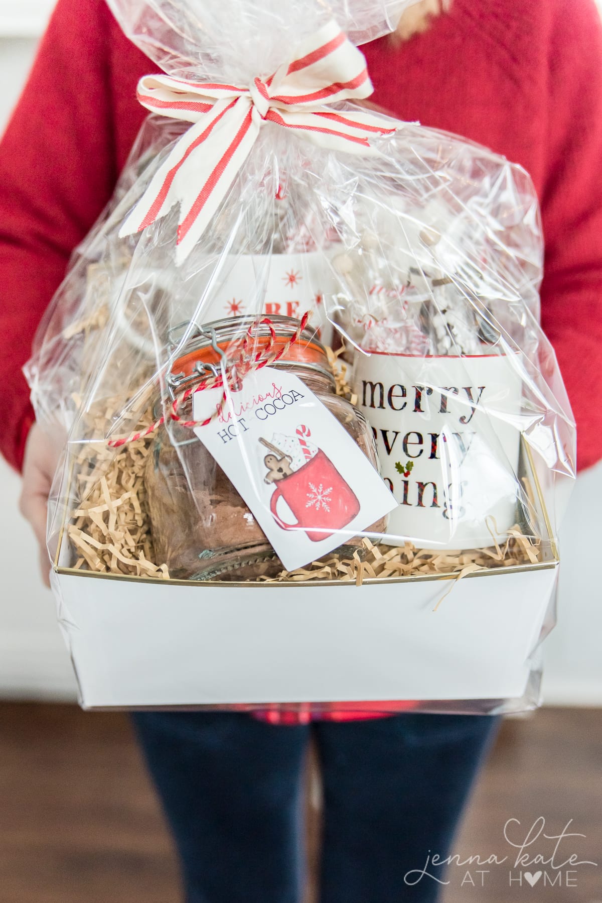 Woman holding the homemade hot chocolate mix gift basket