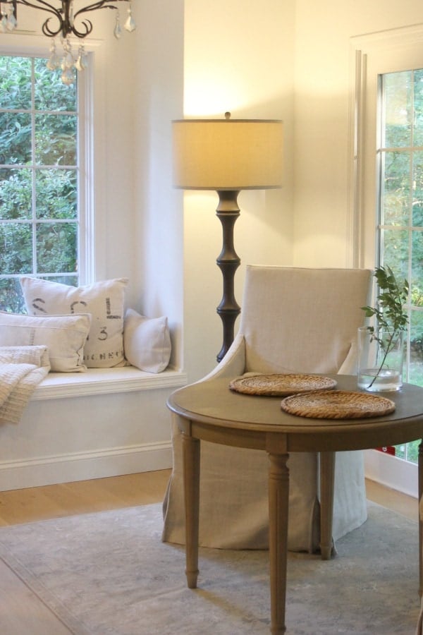 A living room filled with furniture and a large window