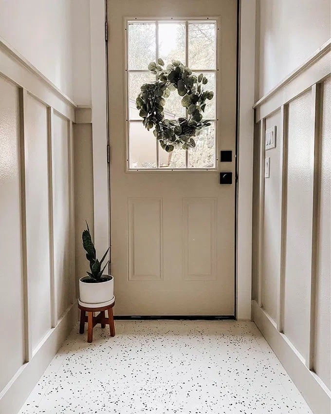 White trim with painted door and contrasting millwork