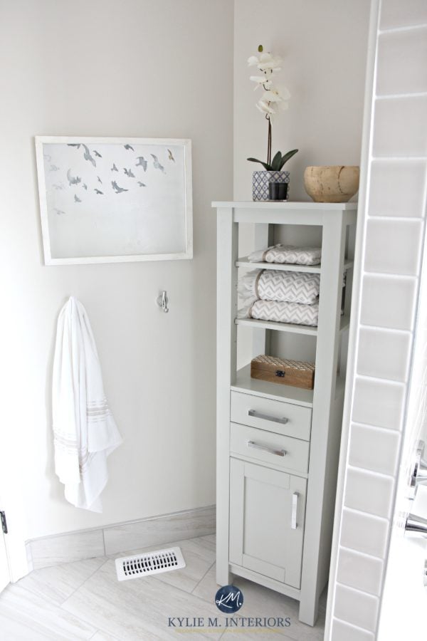 bathroom with gray floor tile and classic gray walls