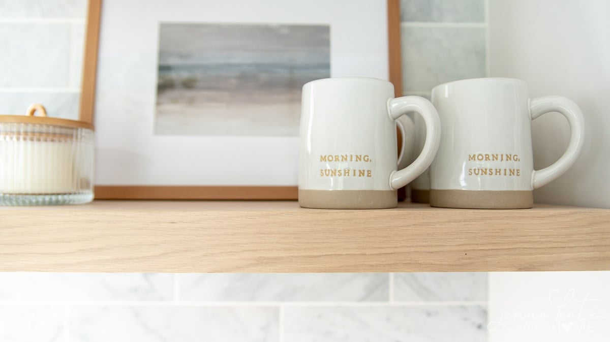mugs on the kitchen shelf