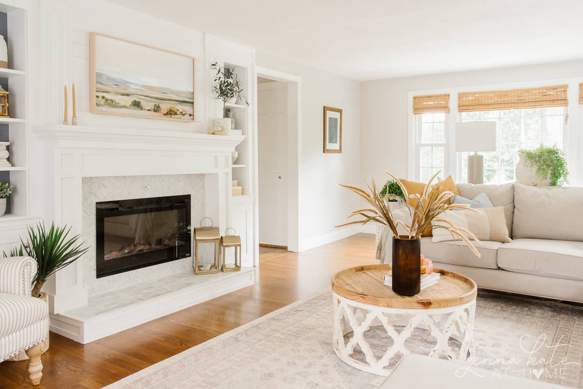 view of living room with coffee table and fireplace