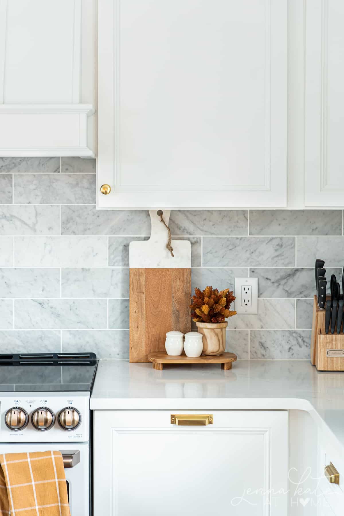 fall themed objects next to the kitchen stove