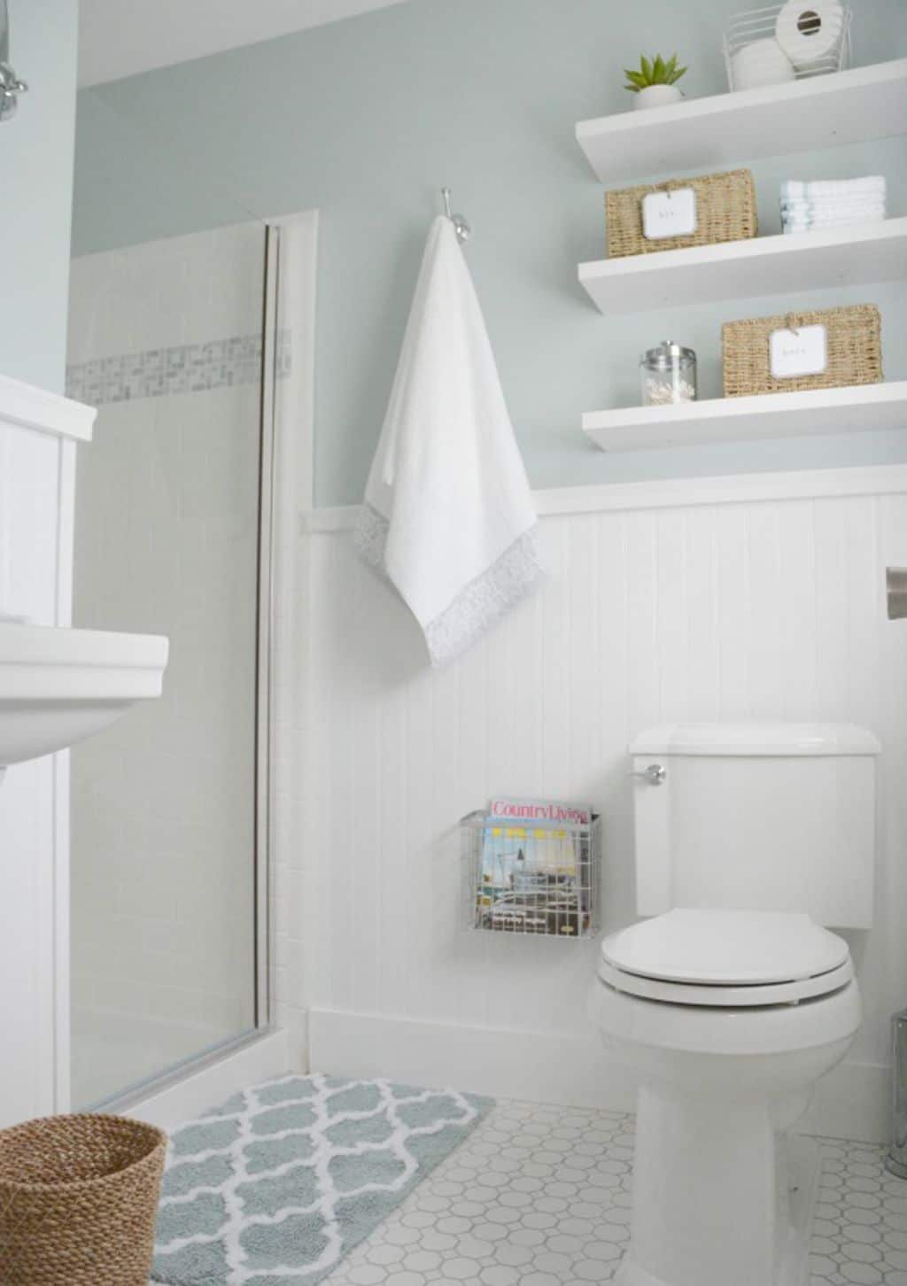 white bathroom with waiscoting and top of the walls painted Rainwashed