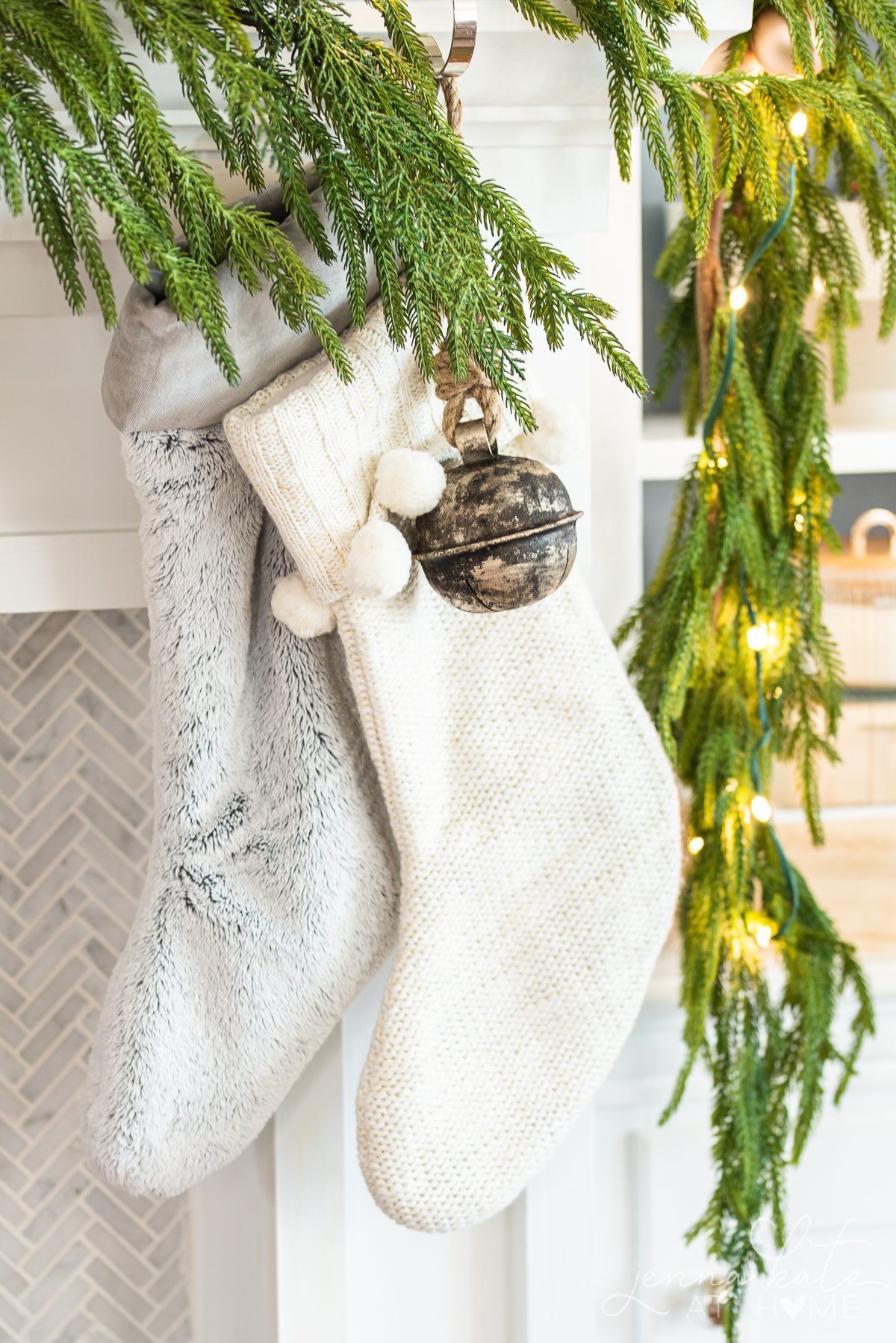 two stockings hanging from the fireplace