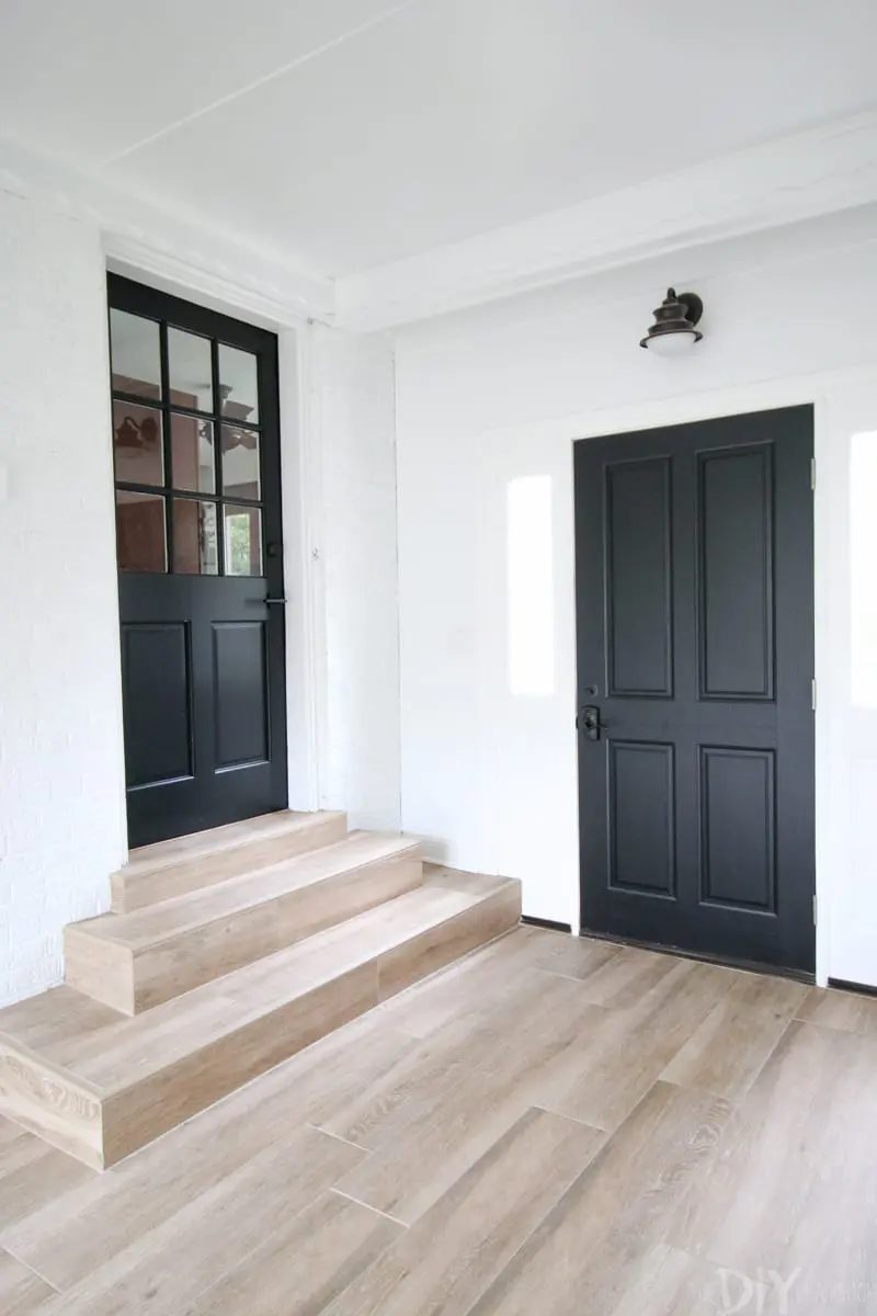 white mudroom walls with 2 doors painted Tricorn Black