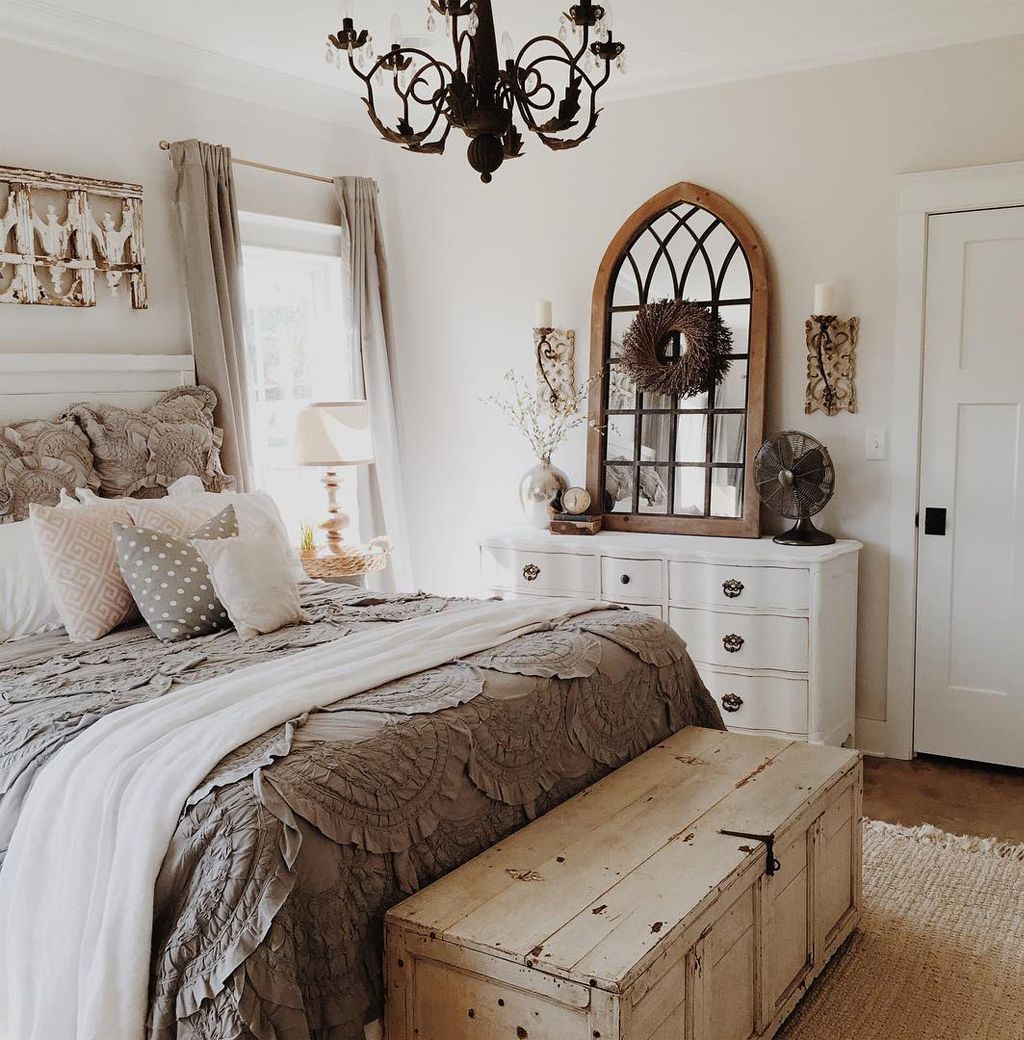 Farmhouse style bedroom with walls painted SW Eider White