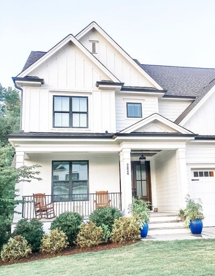 Beautiful two-story house painted with Sherwin Williams Alabaster on the exterior