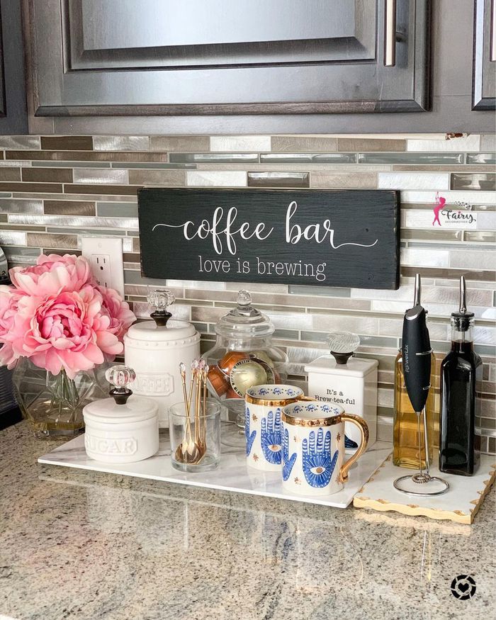 charming. counter coffee bar with pink flower small coffee sign