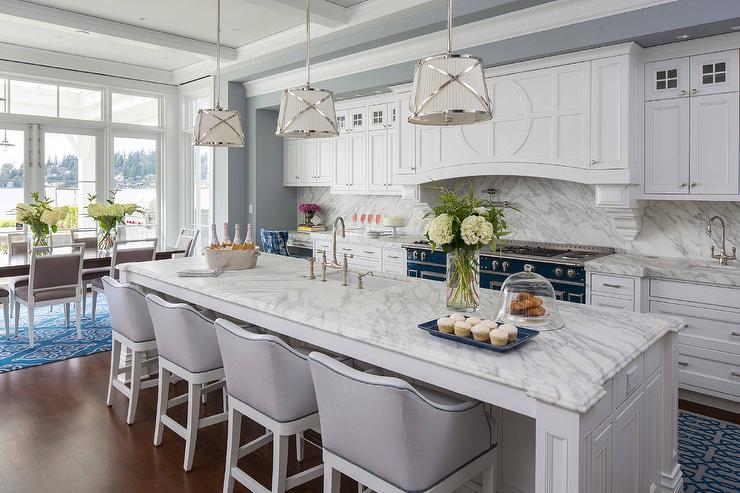 Large kitchen with island and walls painted Passive