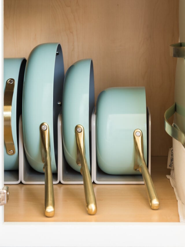 pots and pans organized in a cabinet cabinet