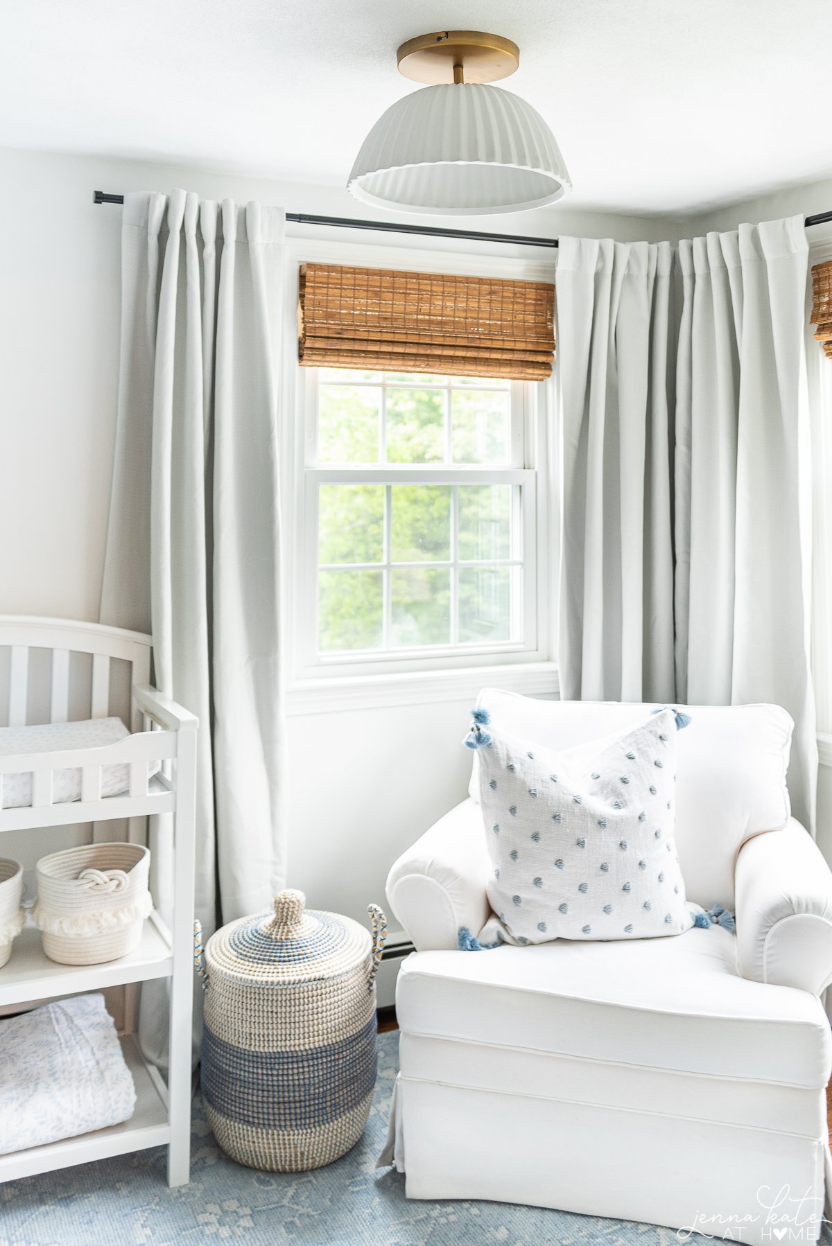 scalloped ceiling light in the nursery