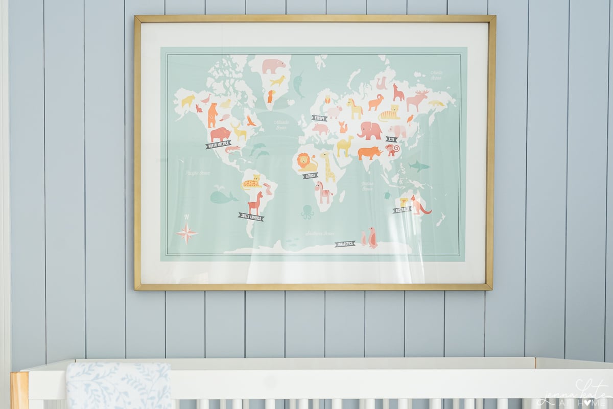 nursery world map over the crib