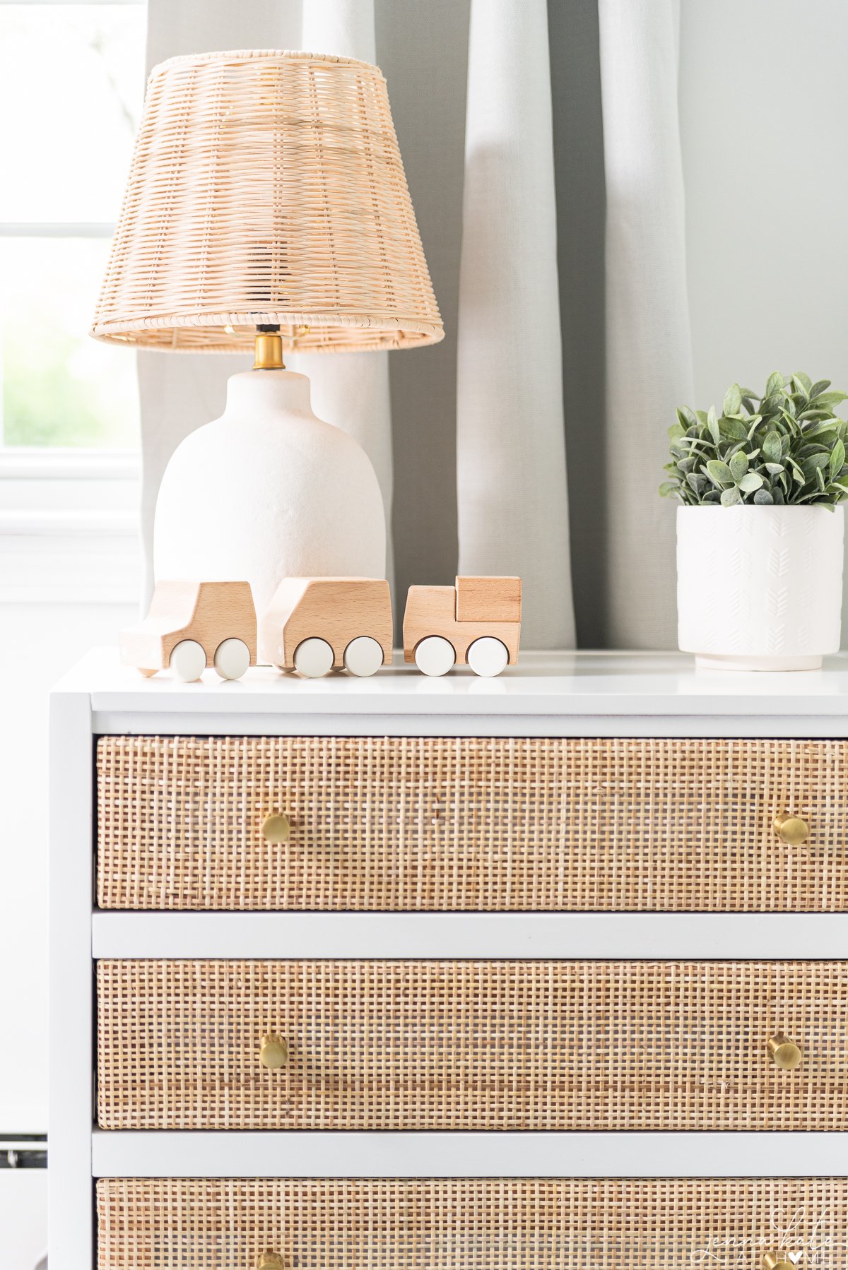 close up of wooden baby toys on the nightstand