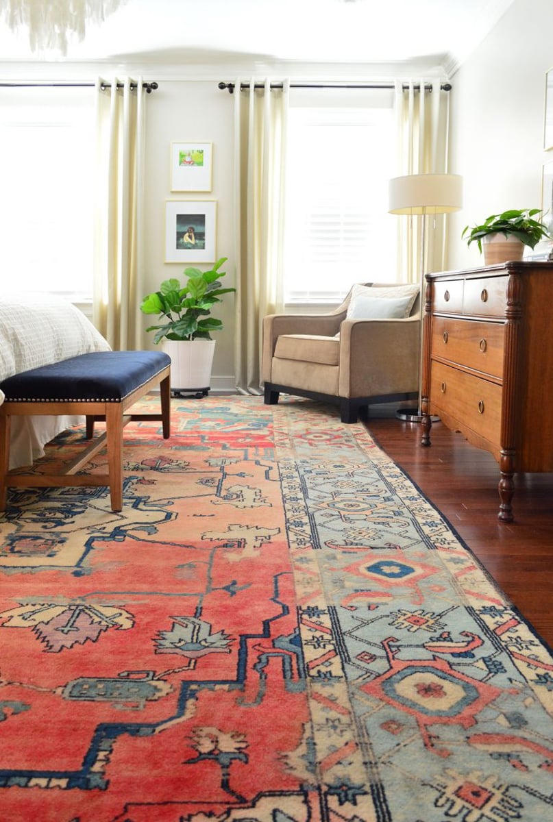 patterned rug with shades of red orange and blue