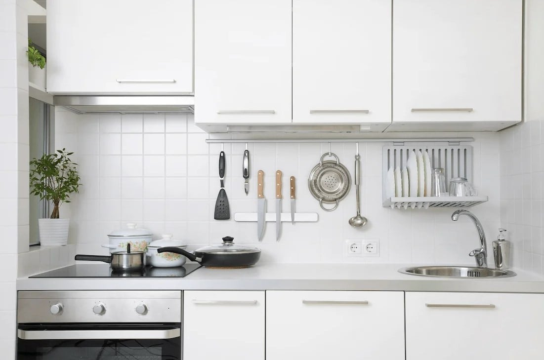 Kitchen Backsplash of white square tiles with straight lines