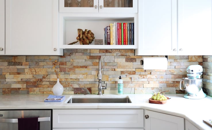 stacked stone kitchen backsplash that goes with white cabinets