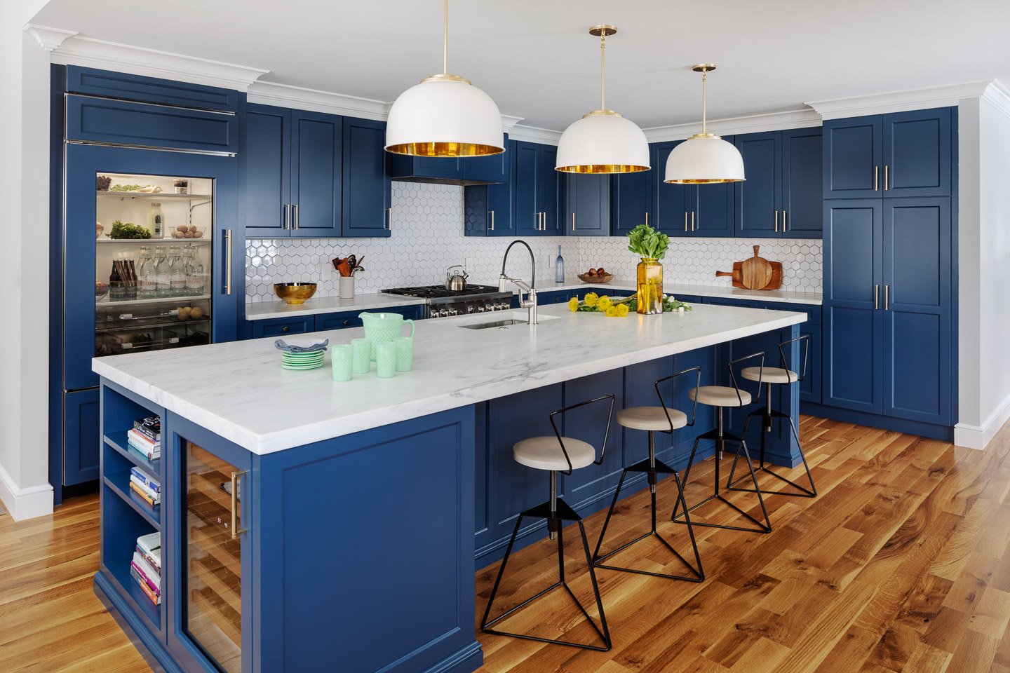 dark blue kitchen cabinets with gray walls