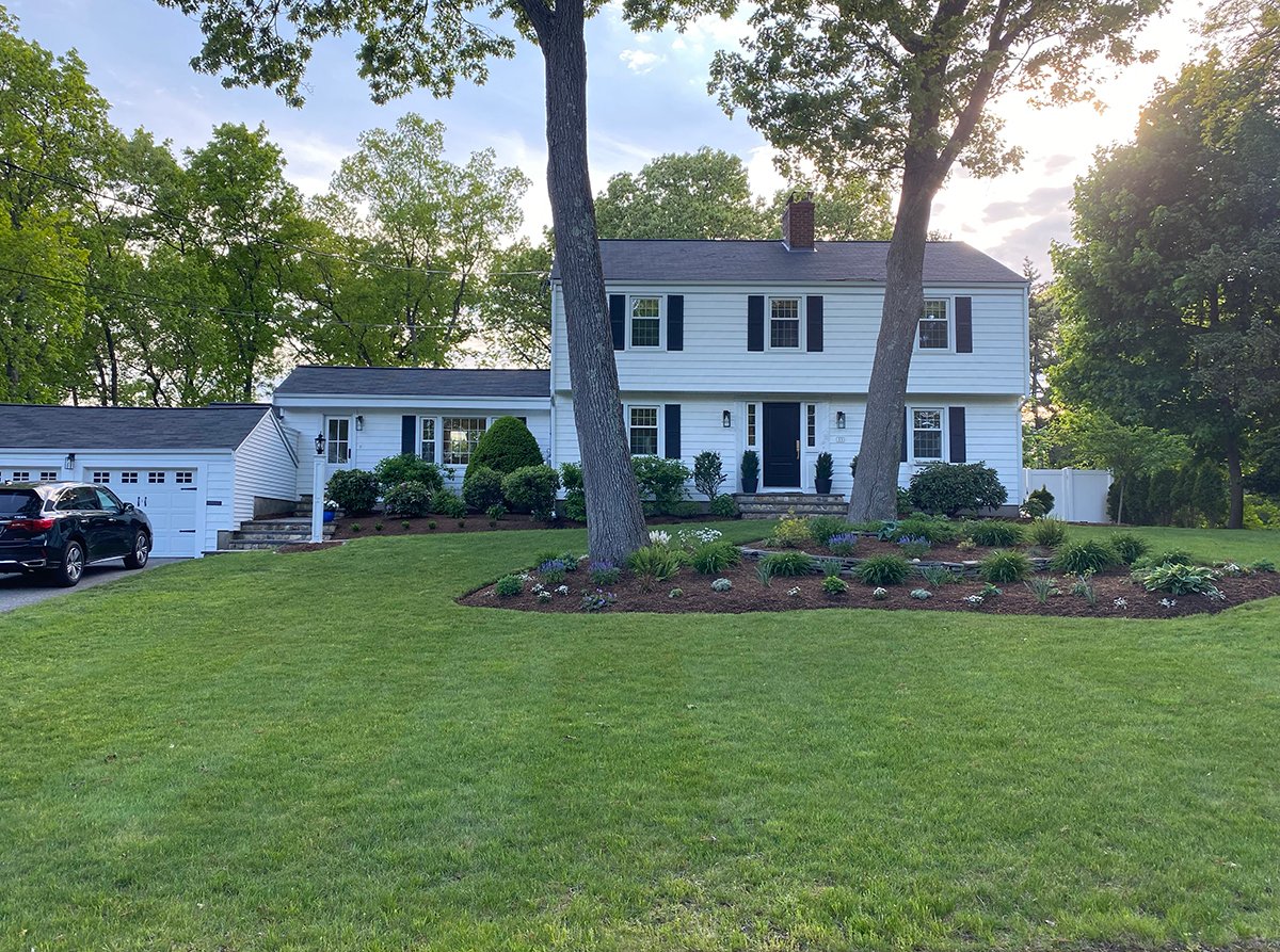 the front of our house after the landscaping project was complete