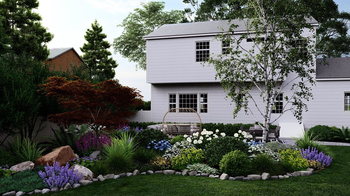 a view of the back of a house with plants