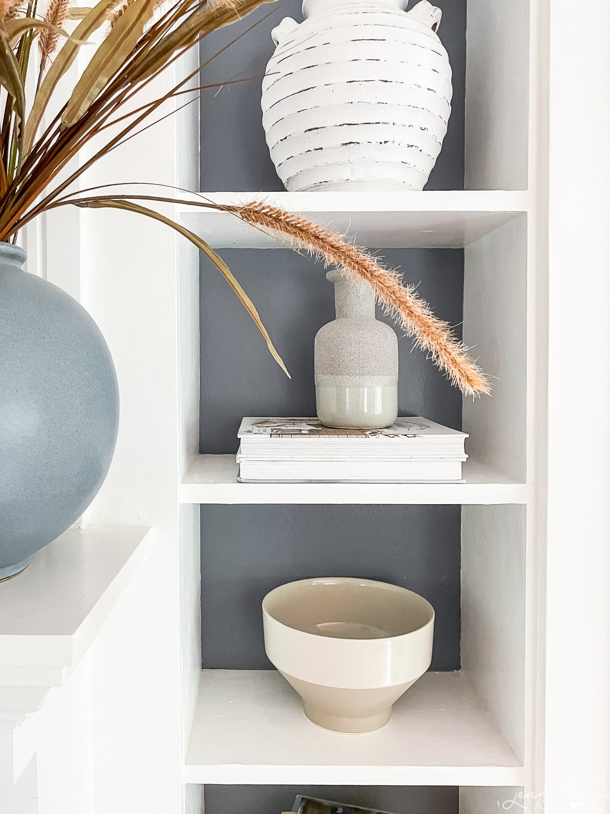 built in bookcase with the backs painted sherwin williams serious gray