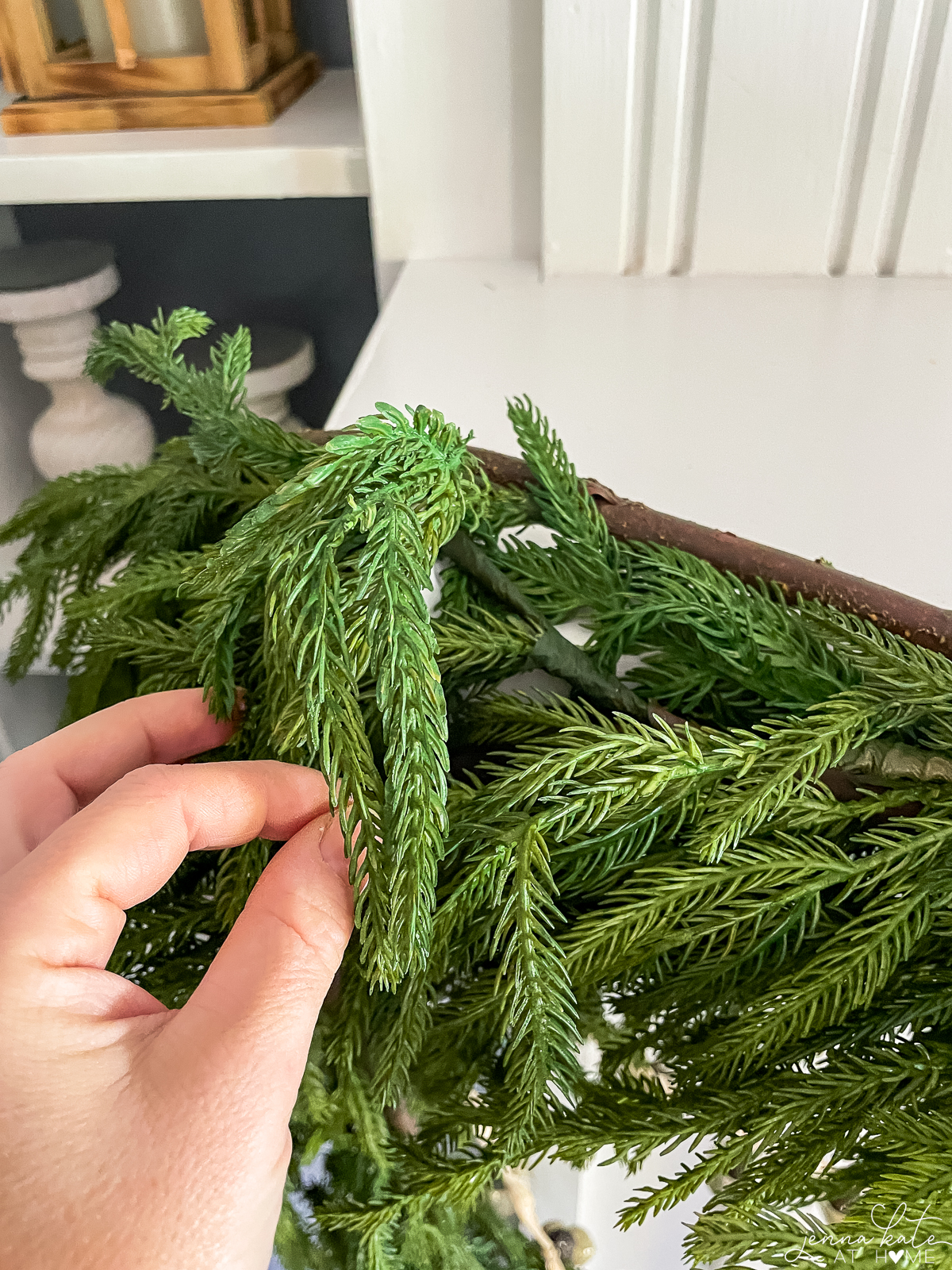 hiding the 3m hook with the norfolk pine garland