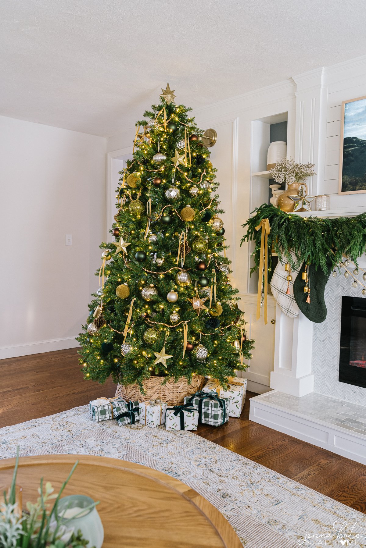 Christmas tree decorated with gold and mustard colored ornaments