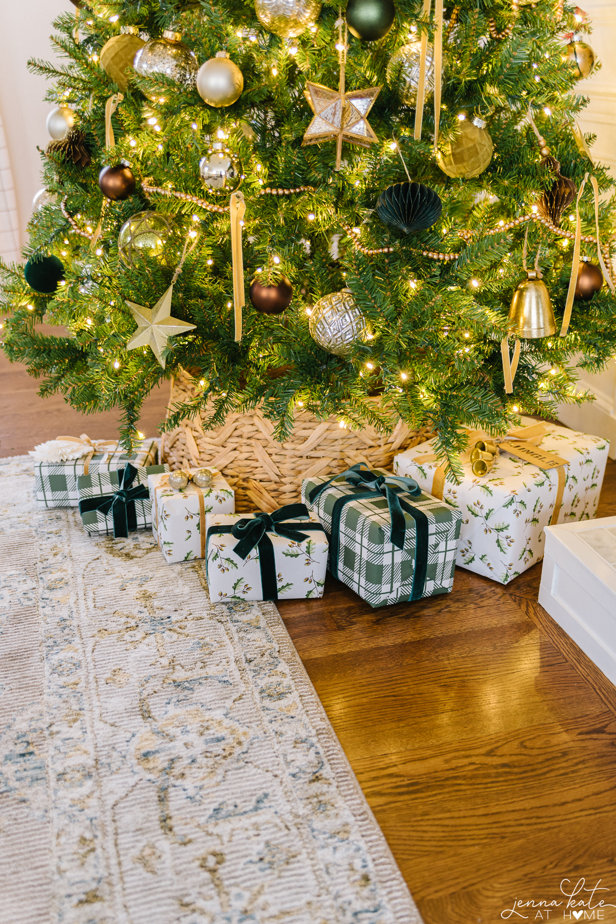 wrapped gifts under the tree with velvet ribbon