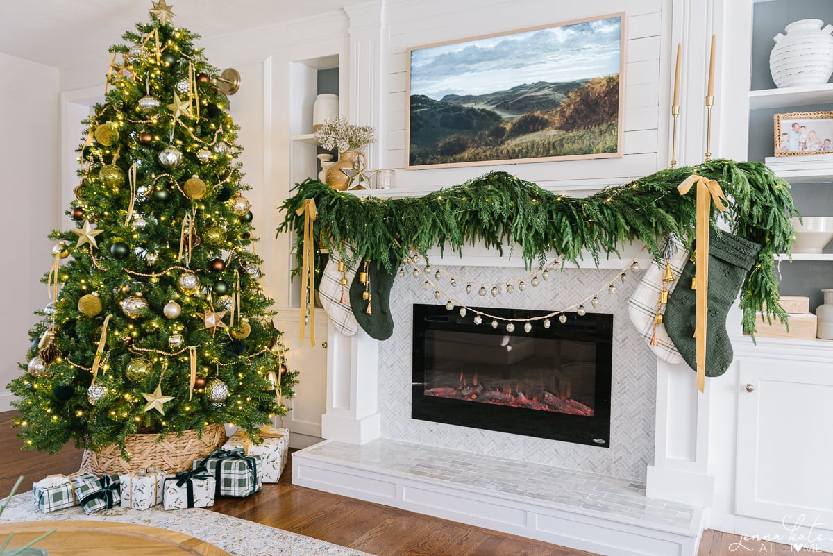 Christmas tree and fireplace mantel with garland