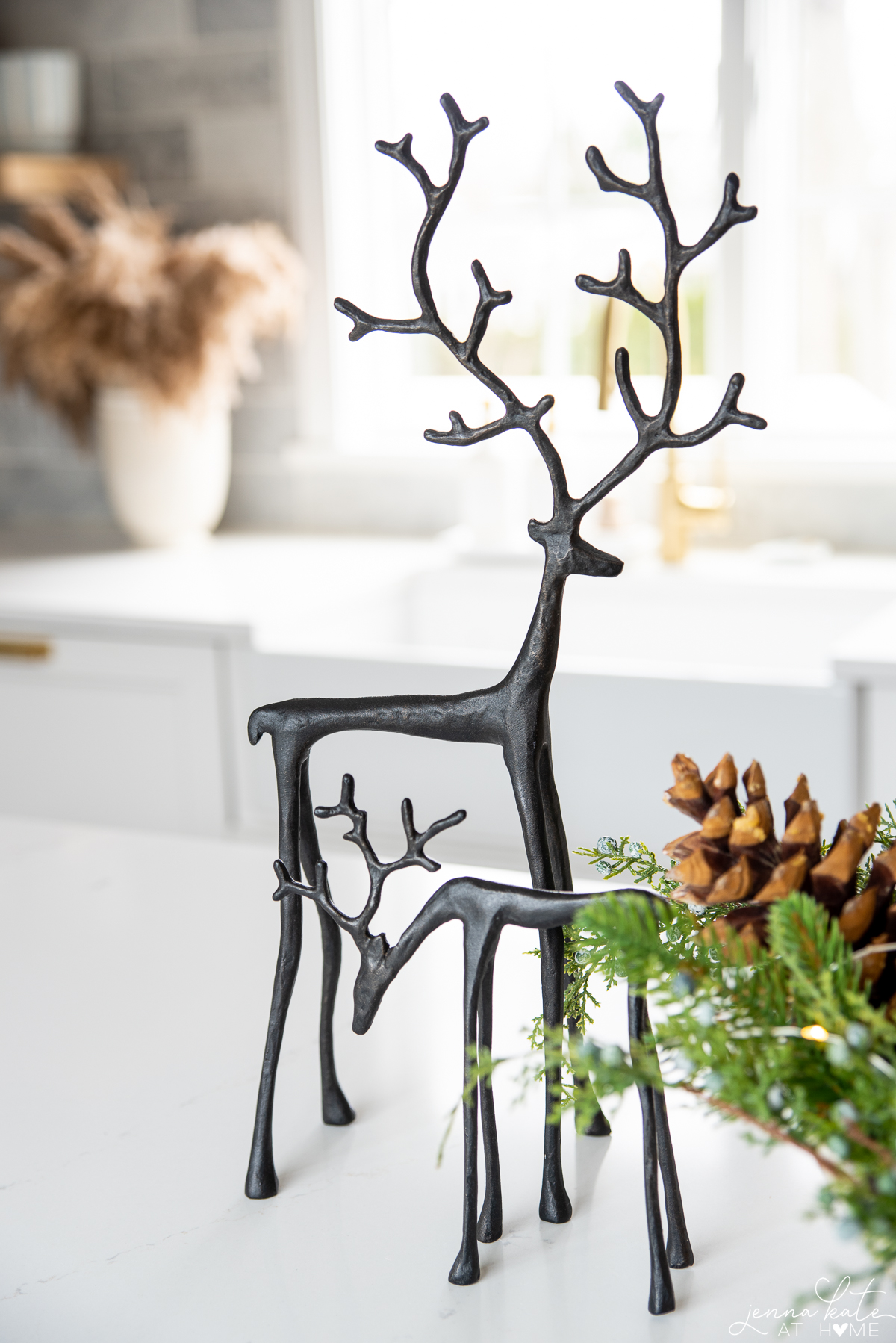 bronze sculpted reindeer on a kitchen island