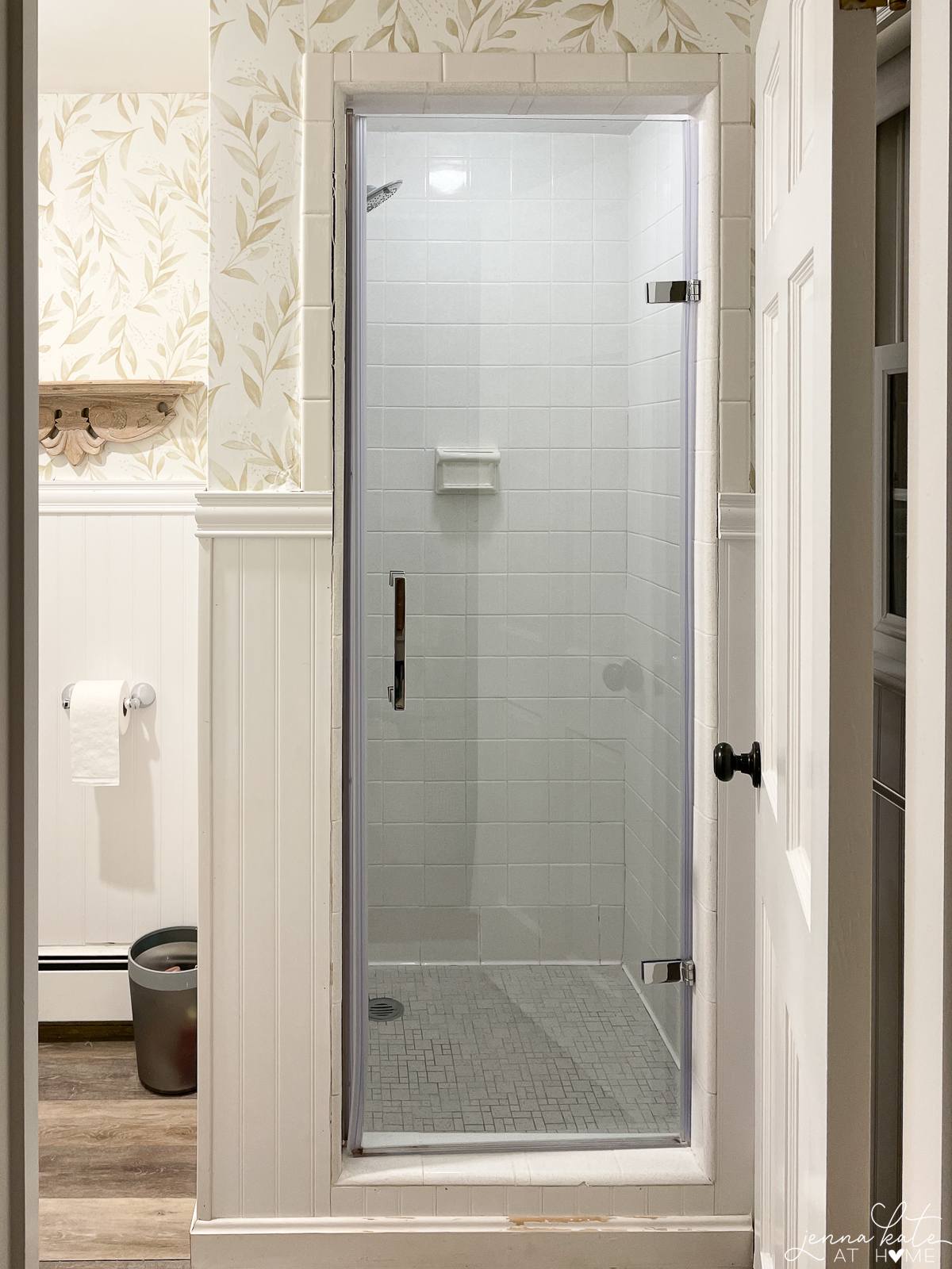 A inside look at our shower before the makeover with missing grout chunks