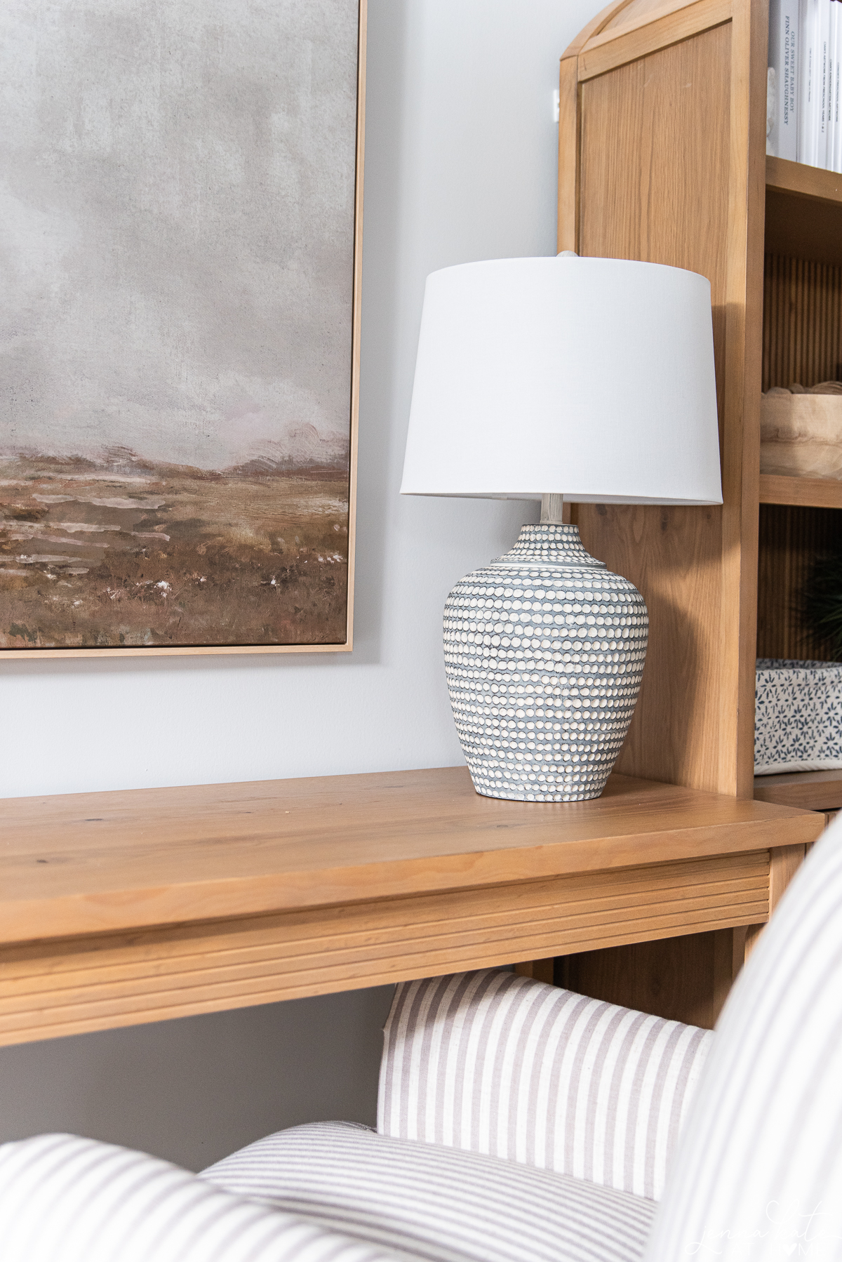 desk with blue Amazon table lamp