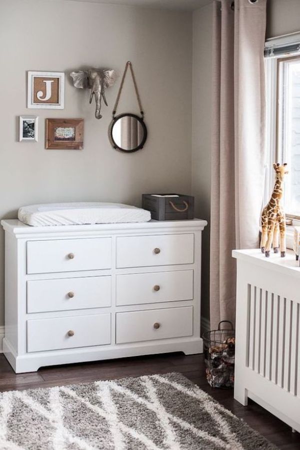 Gender neutral baby room with Revere Pewter walls and zoo themed.