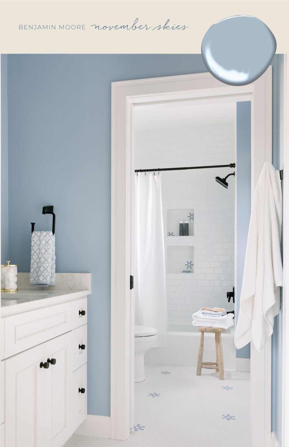 Bathroom with crisp white trim and white vanity and walls painted Benjamin Moore November Skies