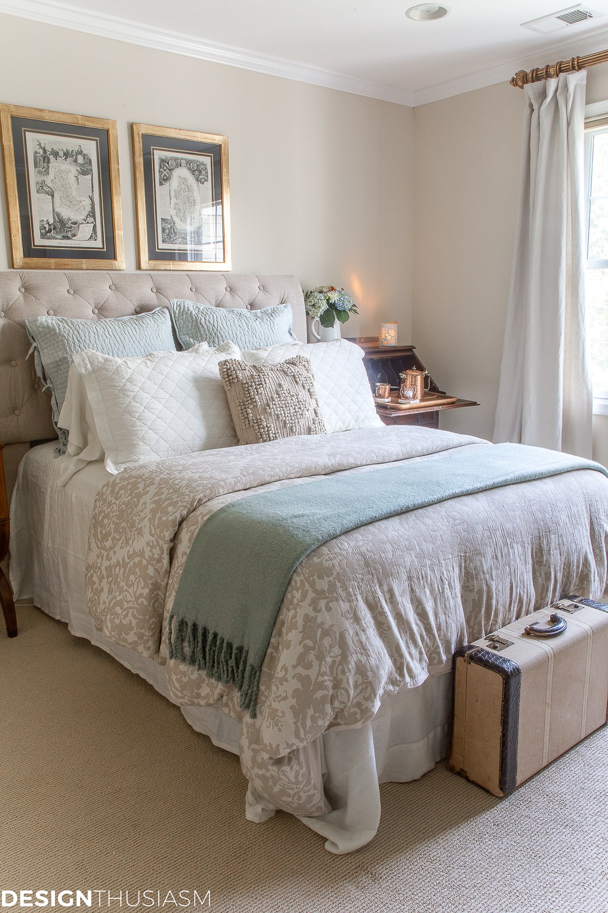 Welcoming guest bedroom with Benjamin Moore Gentle Cream wall color