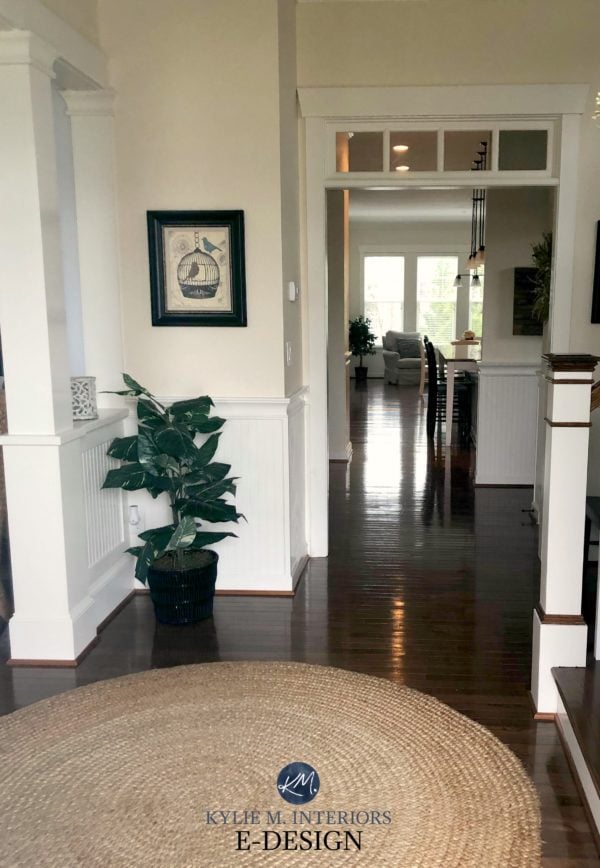 Entry way with dark wood floors and creamy Sherwin Williams Antique White walls. 