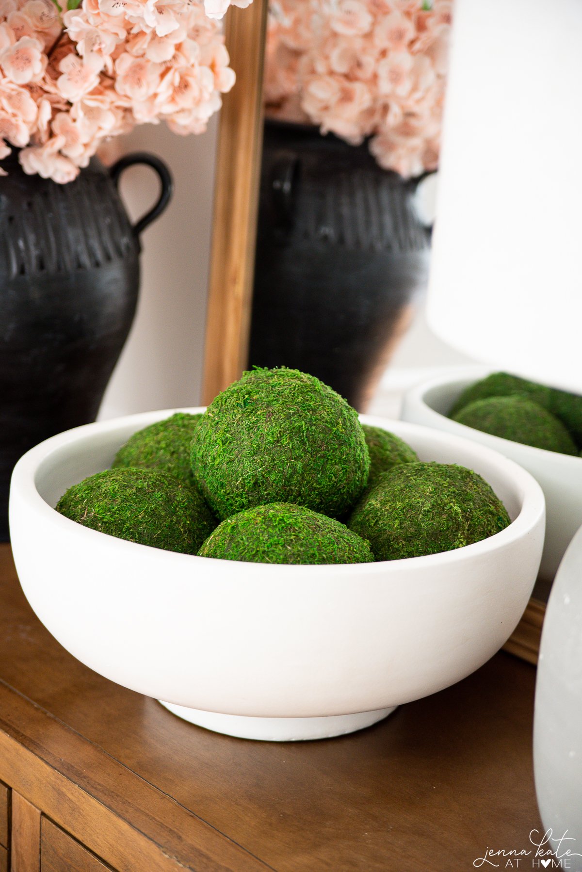 large white bowl filled with moss balls