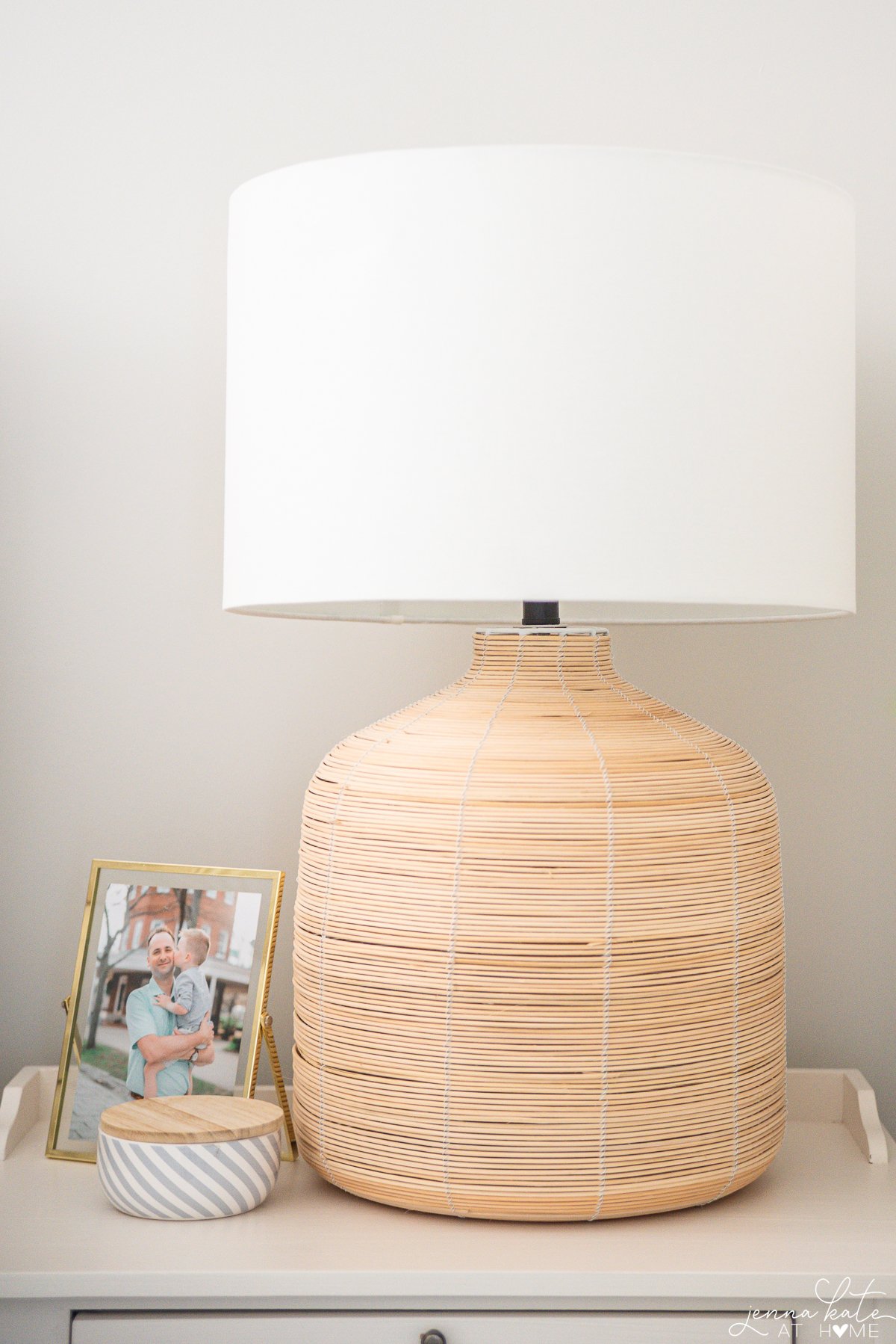 Amazon rattan table lamp on a white nightstand