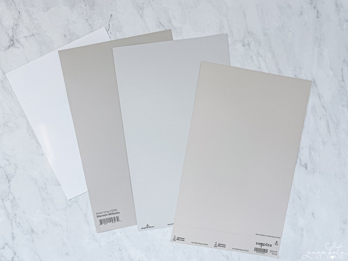 four different shades of gray paint