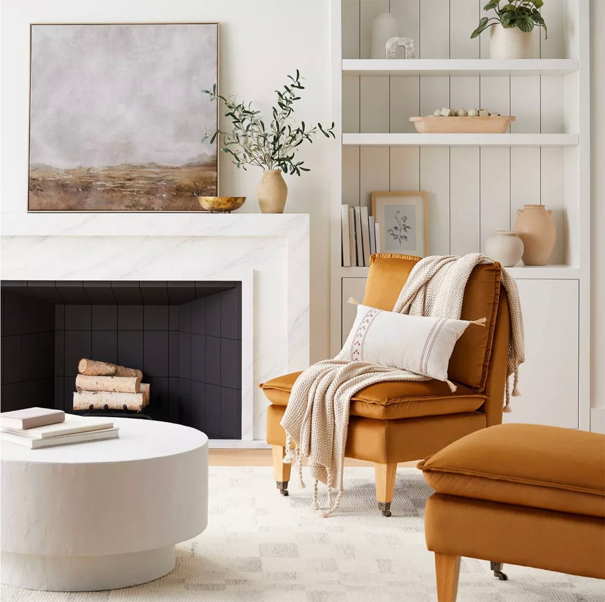 neutral living room with ochre colored arm chairs