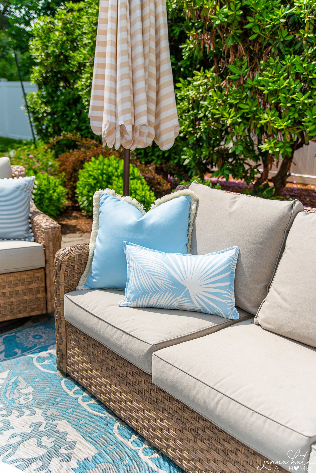 two outdoor pillows on Walmart patio furniture