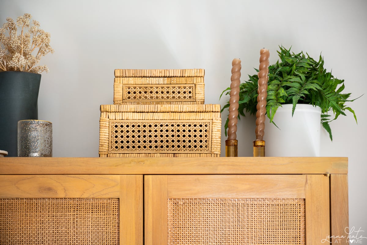 Amazon cane and rattan decorative boxes on top of a cabinet